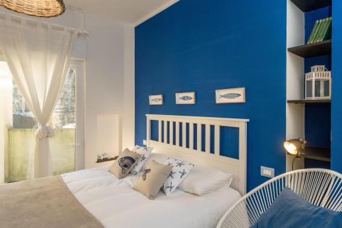 Voodi või voodid majutusasutuse Cinque Terre Moneglia Apartments toas
