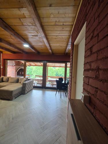 Ένα ή περισσότερα κρεβάτια σε δωμάτιο στο Gaga vikendica