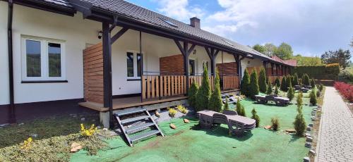 Vonkajšia záhrada v ubytovaní Apartamenty Asturia Rymanów Zdrój
