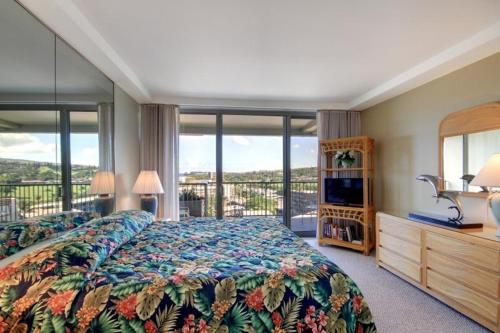 En eller flere senge i et værelse på Whaler #1124 Ocean View