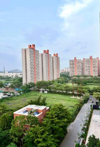 a view of a city with tall buildings at Viento in Dehu Road