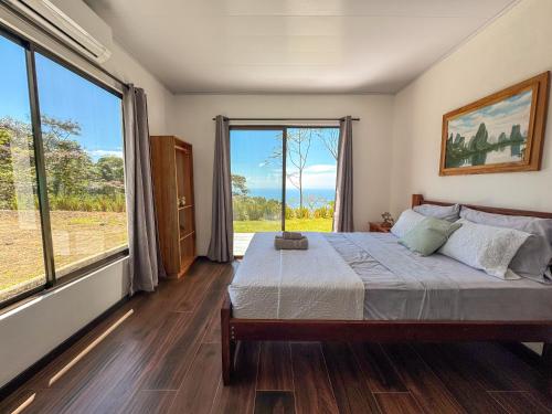 Postel nebo postele na pokoji v ubytování Canavida Villas & Resort