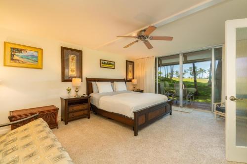 En eller flere senge i et værelse på Maui Eldorado #H104 Garden View