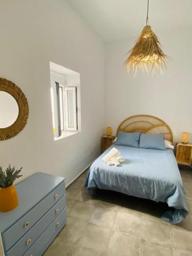 Кровать или кровати в номере Casa Medialuna