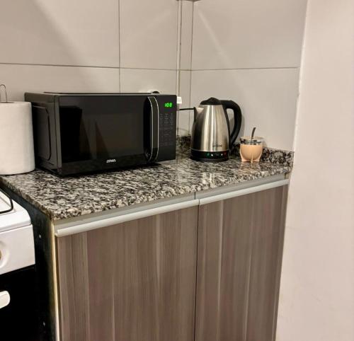 Kuchyň nebo kuchyňský kout v ubytování Apartment in Saladillo