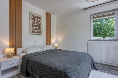 Postel nebo postele na pokoji v ubytování Villa Kontesici 14