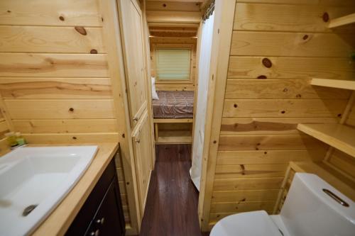 a small bathroom with a sink and a toilet at Mount Hood Village in Welches