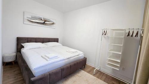 Ένα ή περισσότερα κρεβάτια σε δωμάτιο στο Modern Zen Stay