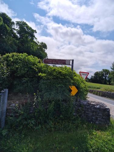 a street sign on the side of a road at Castle view Cabin 