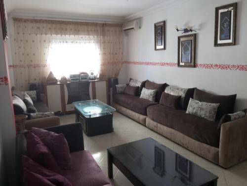 Posezení v ubytování Grand Appartement Martil