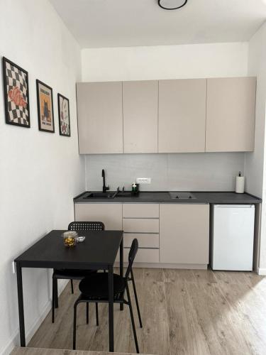 Η κουζίνα ή μικρή κουζίνα στο Cloud 9 Apartment