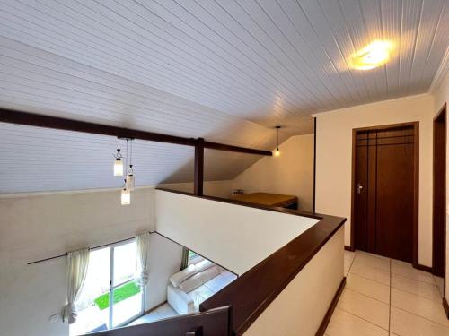 a room with a staircase in a house at Recanto da montanha in Teresópolis