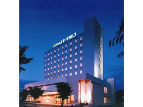a hotel building with a sign on top of it at Hotel Okhotsk Palace - Vacation STAY 24148v in Mombetsu