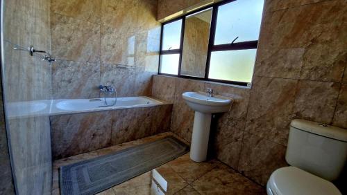 Et badeværelse på 7 Heaven Boutique Hotel