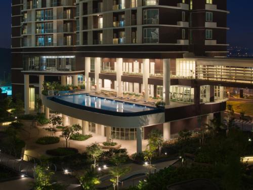 an aerial view of a building at night at Somerset Medini Iskandar Puteri in Nusajaya