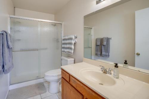 a bathroom with a sink and a shower and a toilet at Patio and Pool Access Golf Getaway in Peoria in Peoria
