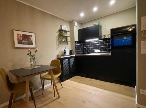 Kuchyň nebo kuchyňský kout v ubytování #1 Studioapartment mit Loreleyblick direkt an der schönsten Etappe des Rheinsteigs