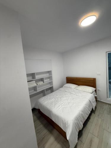 Llit o llits en una habitació de studio apartament Tirane