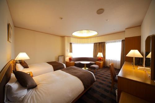 Cama o camas de una habitación en Hotel Granvia Wakayama