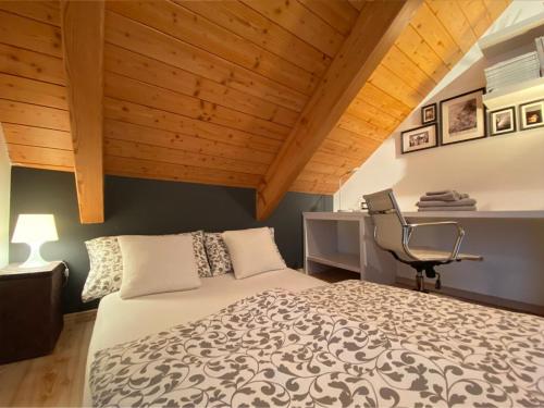 Giường trong phòng chung tại Esclusivo appartamento tra le Dolomiti