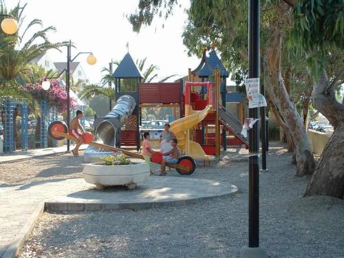 a group of people playing in a playground at Le Stelle Del Tirreno in Falcone