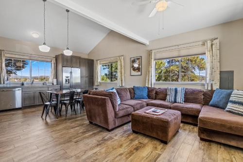 a living room with a couch and a table at Jupiter Drive in Anchorage