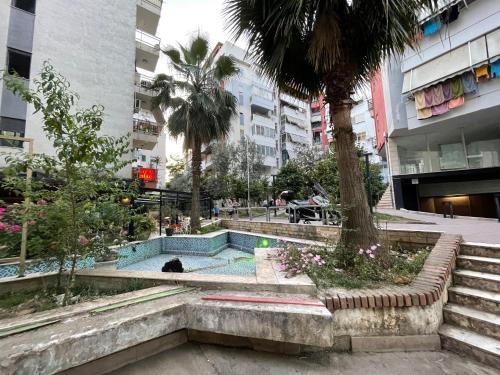 a swimming pool in the middle of a city at B&B - Private rooms 3 in Tirana