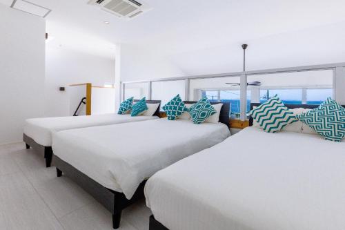 Giường trong phòng chung tại Kunigami-gun - House / Vacation STAY 2562