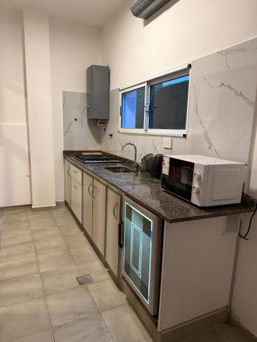 Dapur atau dapur kecil di Monoambiente Guemes PB para 2 personas