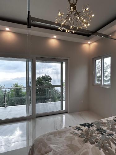 Ένα ή περισσότερα κρεβάτια σε δωμάτιο στο Zafira Luxe