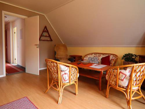 Ruang duduk di Modern Apartment in Wittenbeck with Terrace, Fenced Garden