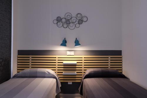 Cama o camas de una habitación en Alboran Premium Arysal