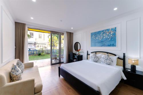 Ένα ή περισσότερα κρεβάτια σε δωμάτιο στο Ancient Beach Boutique & Spa - Beachfront Hotel