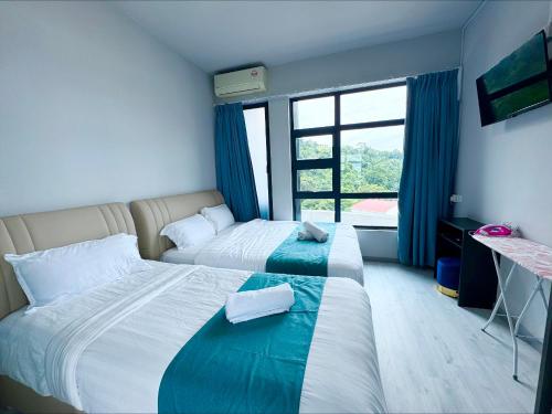 Ένα ή περισσότερα κρεβάτια σε δωμάτιο στο Sunset Seaview Vacation Condos @ Jesselton Quay