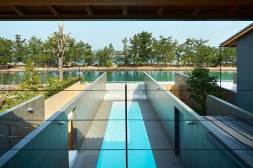 an external view of a swimming pool from a house at Villa NIGIN in Miyazu