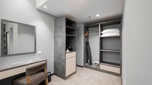 Postel nebo postele na pokoji v ubytování Fives Hotel DNP