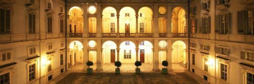 an empty building with trees in the middle of it at B&B Saluzzo Paesana 1718 in Turin