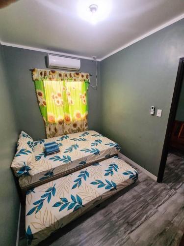 Katil atau katil-katil dalam bilik di Tarlac Zel House