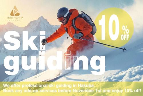 a poster of a man skiing down a mountain at MOMO HAKUBA by Jade Group in Hakuba