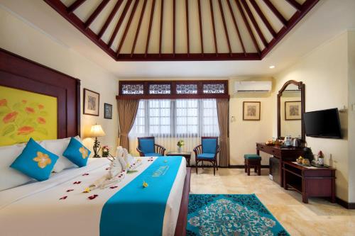 Cama o camas de una habitación en Royal Hotel and Villa Bali