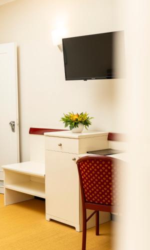 TV a/nebo společenská místnost v ubytování Hotel Fabricia