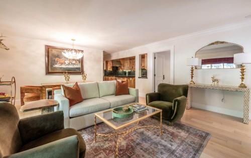 a living room with a couch and chairs and a table at New Listing 3 BR 3 BA Aspen Condo near Gondola in Aspen