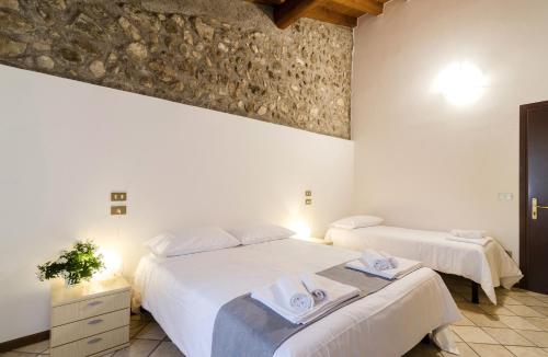 Giường trong phòng chung tại Agriturismo La Torretta da Valentina