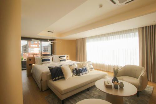 Katil atau katil-katil dalam bilik di LePont Riverfront Resort Nongkhai