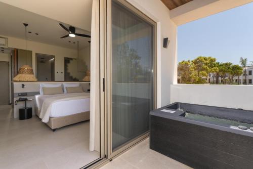 Ένα ή περισσότερα κρεβάτια σε δωμάτιο στο Marinos Beach Hotel