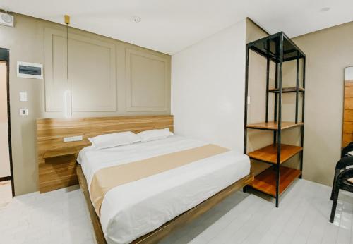 Una cama o camas en una habitación de Lix Hotel Surigao