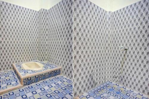Ένα μπάνιο στο Hotel O Rudang Rudang Sibayak