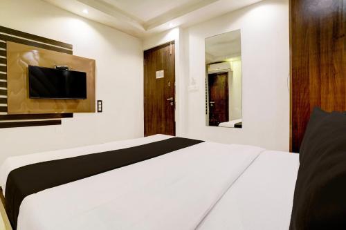 Кровать или кровати в номере Super Hotel O Mumbai Central Formerly Park Palace