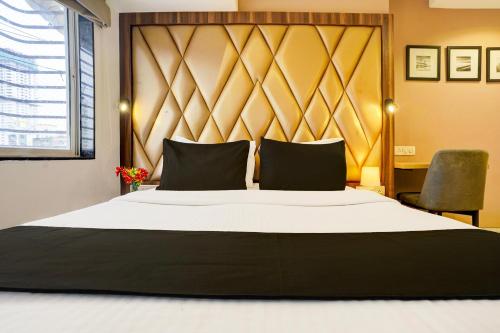 Кровать или кровати в номере Super Hotel O Mumbai Central Formerly Park Palace