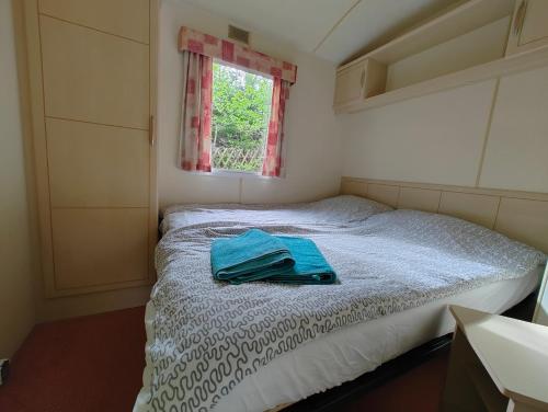 Postel nebo postele na pokoji v ubytování Domek Holenderski z wielkim tarasem, Domek na Mazurach, Szlak Wielkich Jezior